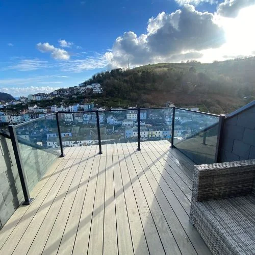 Raised garden decking with glass balustrade