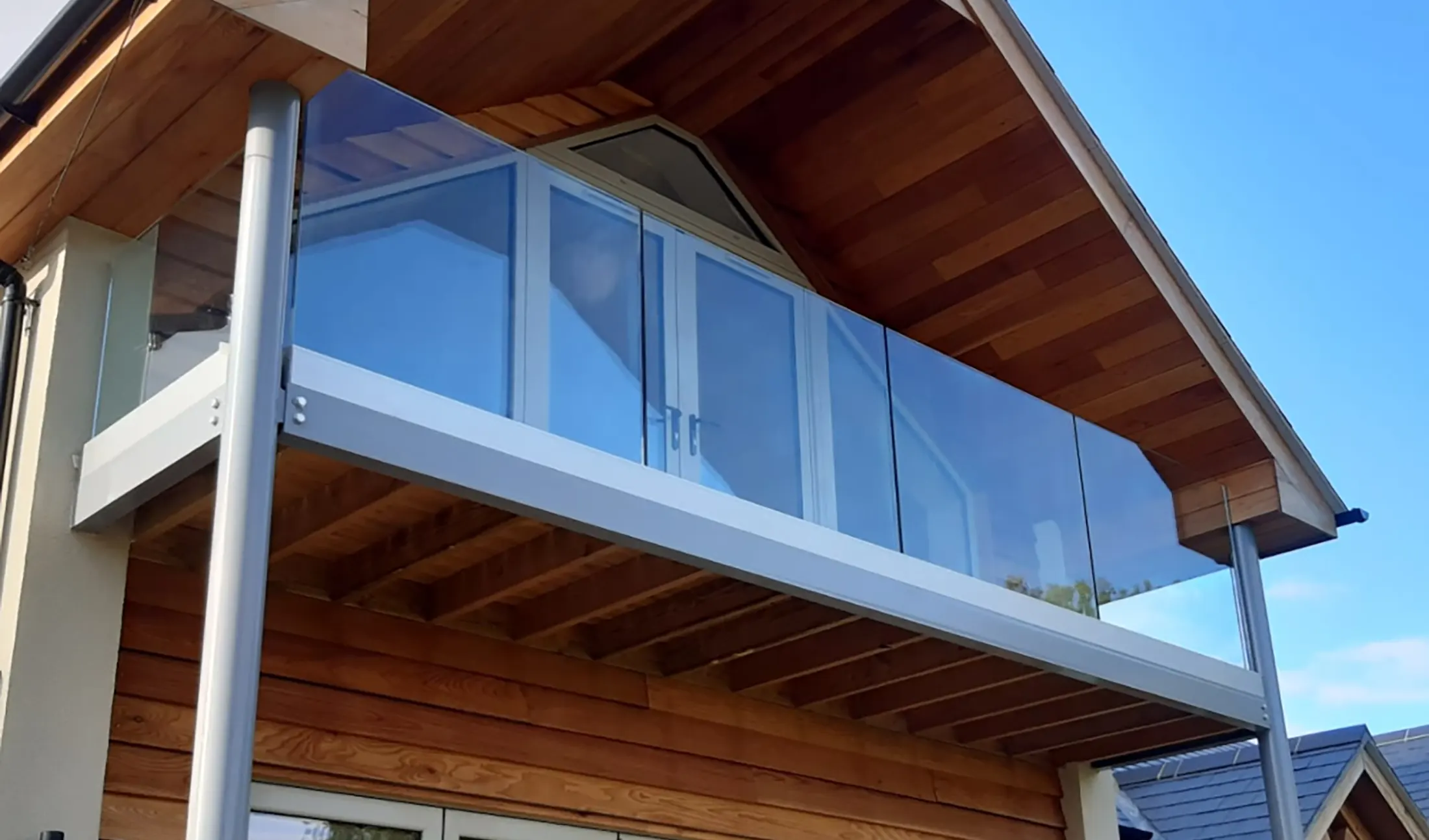 Glass balustrade, staircase and decking project in South Devon
