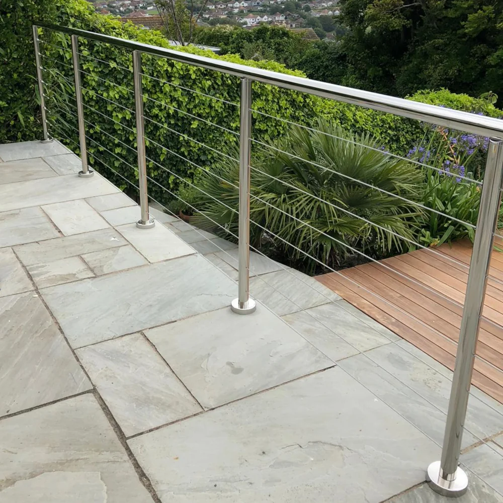Outdoor steps and decking beside greenery